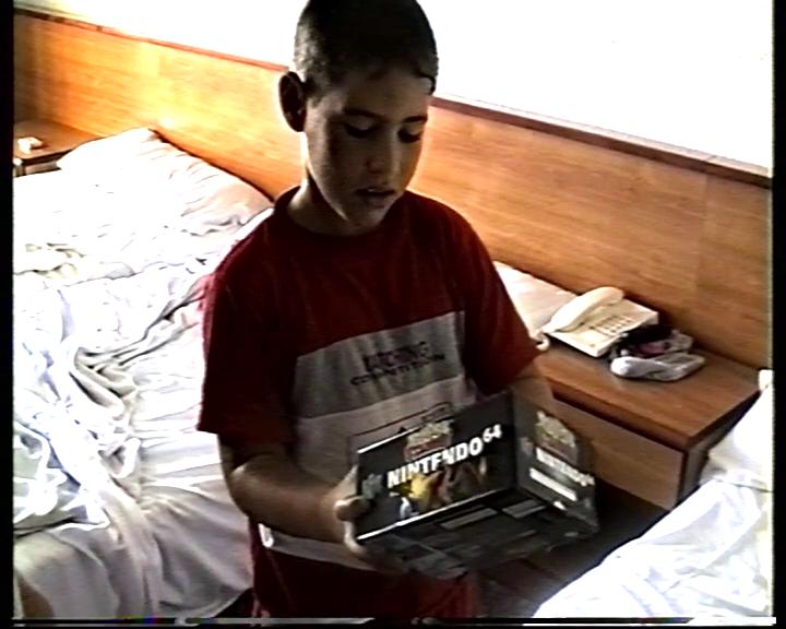 Adrià receiving Pokémon Stadium for his Nintendo 64 in July 2000