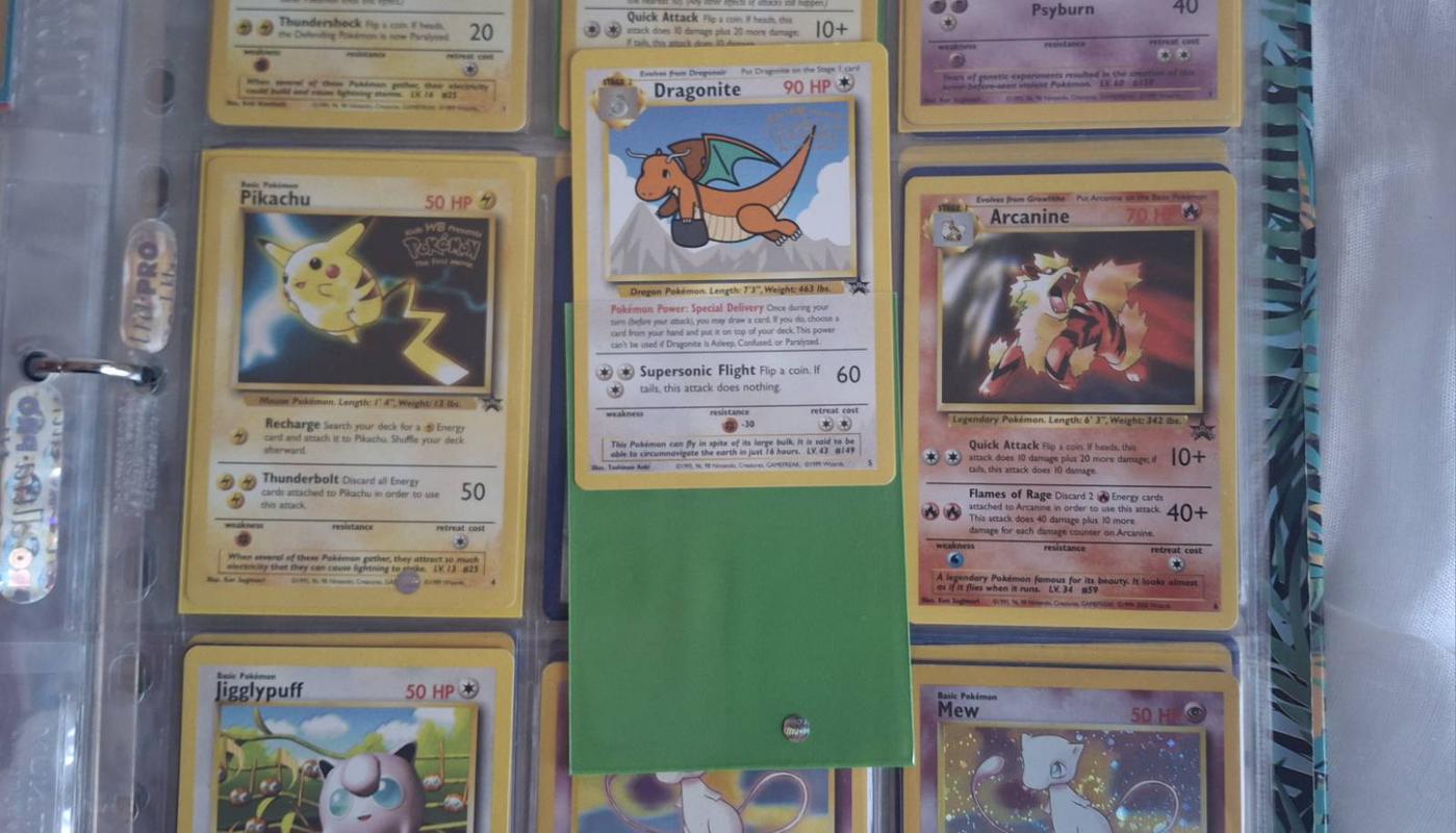 Adam’s Dragonite WB (Warner Bros) stamped promo card was another notable addition to his collection
