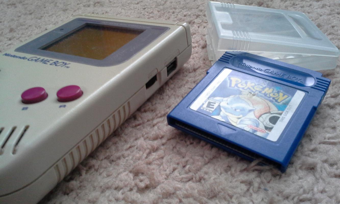 Tyler's original Game Boy that he got for his 5th birthday, and his copy of Pokémon Blue, acquired by trading a bottle of Sprite