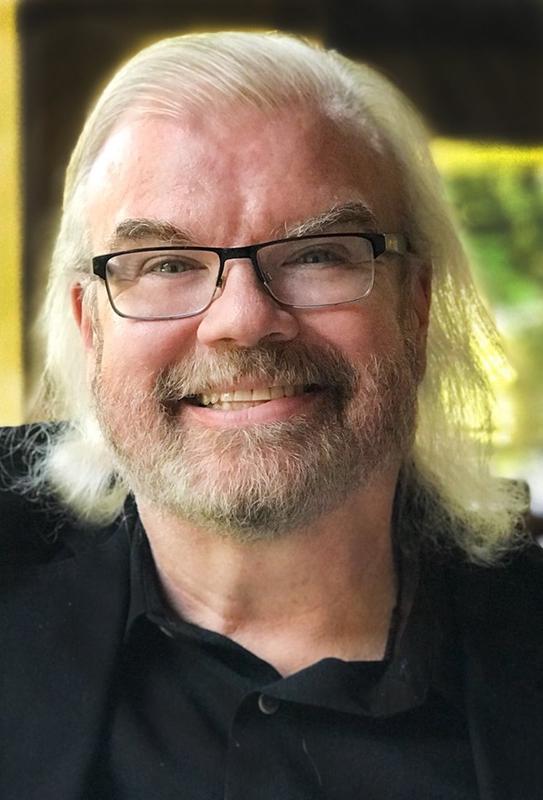A photograph of James Carter Cathcart, the original voice of Gary Oak