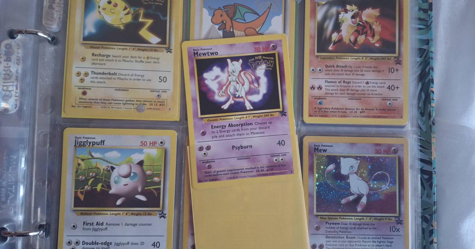 Adam’s collection of Pokémon promo cards from the Wizards of the Coast era, highlighting Mewtwo (Black Star Promo 3)