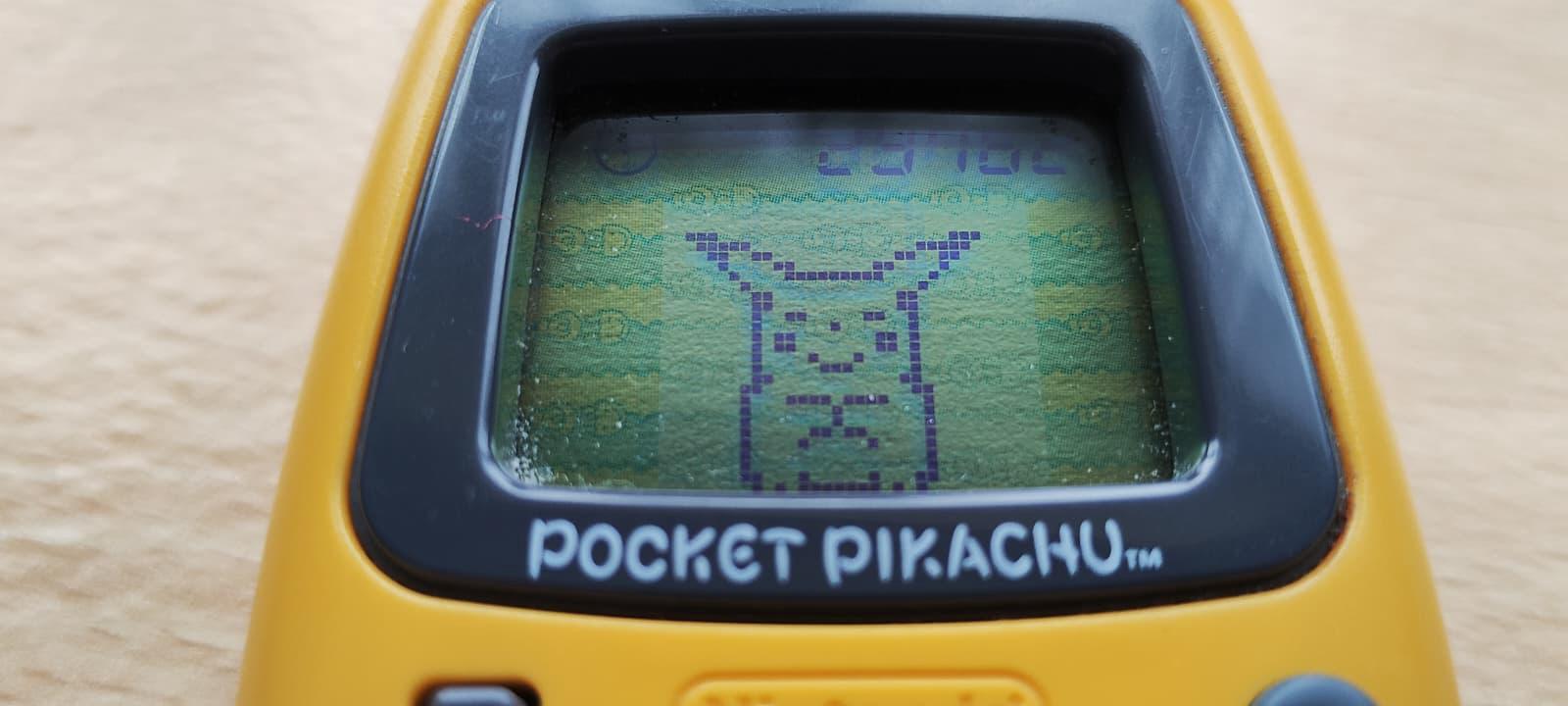 Pikachu rubbing his paws together, looking rather sinister