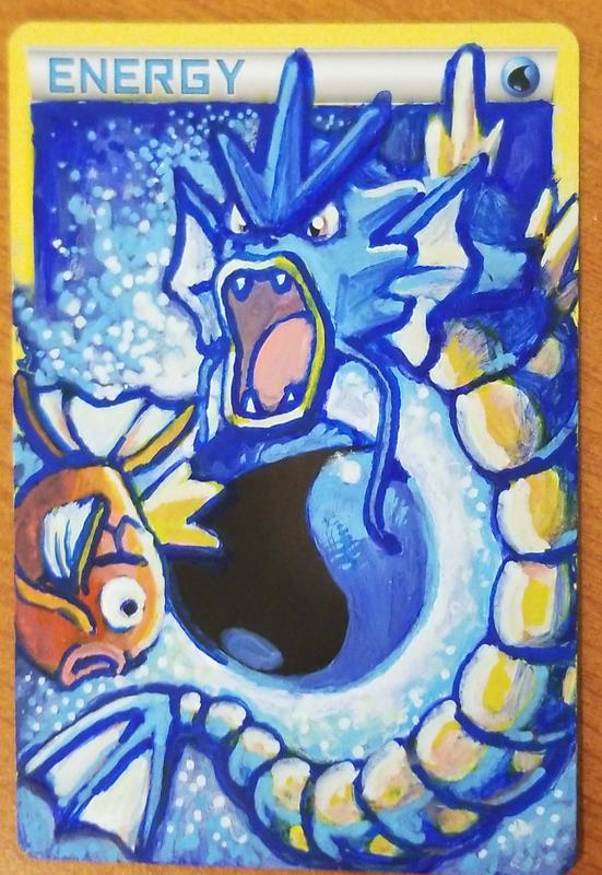 A custom full art Fire Energy card featuring Gyarados and Magikarp