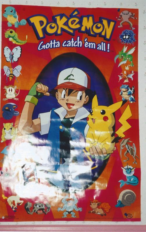 A photograph of a poster from Steph's bedroom wall, featuring Ash Ketchum, taken between 1998 and 2001
