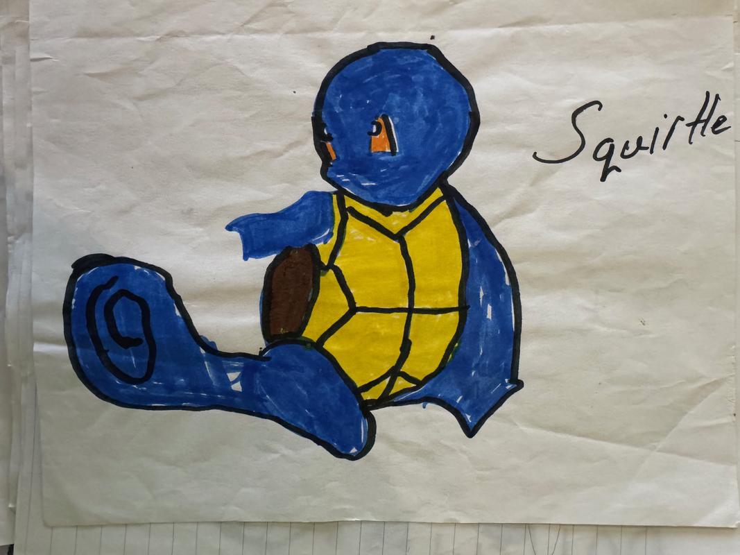 A photograph of Jed’s Squirtle drawing